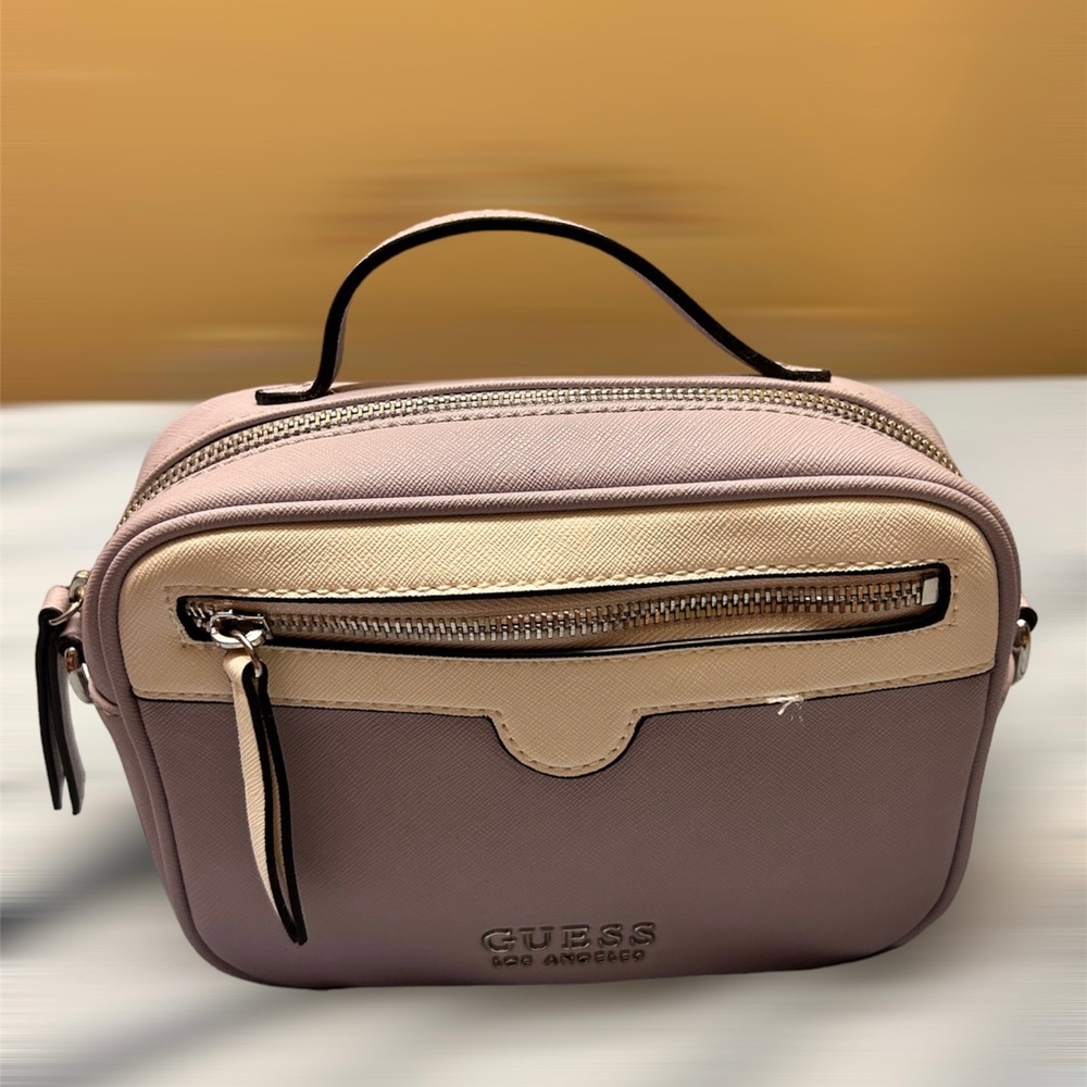 Selling this guess bag